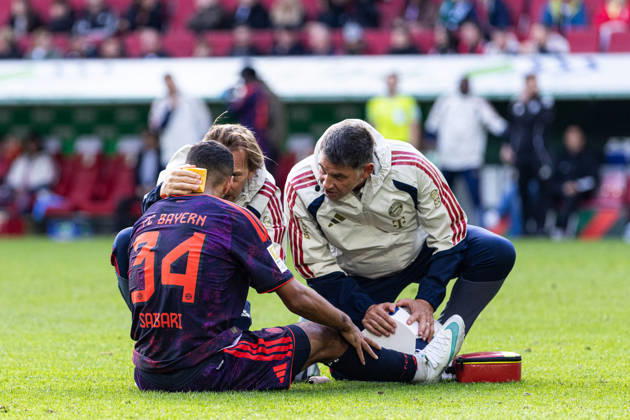 Germany: FC Augsburg vs. FC Bayern Munich, Bundesliga 1, Matchday 5, 2026–27 Season, WWK Arena, Augsburg; Ismael Saibari, FC Bayern Munich, 34, lying on the ground in pain, Augsburg WWK Arena, Bayern, Germany Copyright: xBenedictxChristx