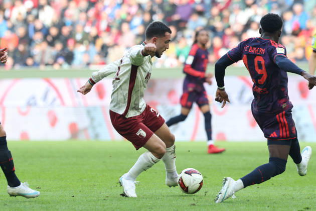 Arijon Ibrahimovic, FC Augsburg, 21, with Alphonso Davies, FC Bayern Munich, 19, GER, FC Augsburg vs. FC Bayern Munich, Soccer, Bundesliga, Matchday 5, 2026–2027 Season, October 10, 2026, DFL and DFB regulations prohibit any use of photographs as image sequences and or quasi-video, GER, FC Augsburg vs. FC Bayern Munich, soccer, Bundesliga, Matchday 5, 2026–2027 season, October 10, 2026, Augsburg Copyright: xEibner-Pressefoto JennixMaulx EP_JML