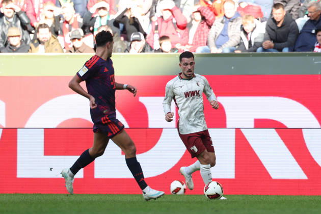 Arijon Ibrahimovic (FC Augsburg), 21, with Aleksandar Pavlovic (FC Bayern Munich), 45, GER, FC Augsburg vs. FC Bayern Munich, Soccer, Bundesliga, Matchday 5, 2026–2027 Season, October 10, 2026, DFL and DFB regulations prohibit any use of photographs as image sequences and or quasi-video, GER, FC Augsburg vs. FC Bayern Munich, soccer, Bundesliga, Matchday 5, 2026–2027 season, October 10, 2026, Augsburg Copyright: xEibner-Pressefoto JennixMaulx EP_JML