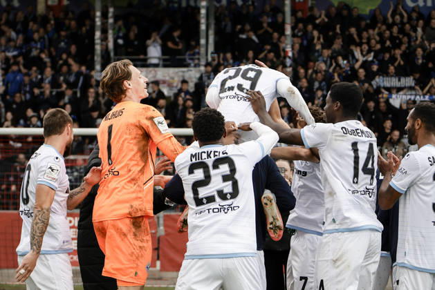October 10, 2026, xhettx, Soccer 3rd Division, SG Sonnenhof Grossaspach vs. SV Waldhof Mannheim – Celebrating with the fans after the game, Nolan Muteba of SV Waldhof Mannheim, No. 29, takes center stage during the celebration