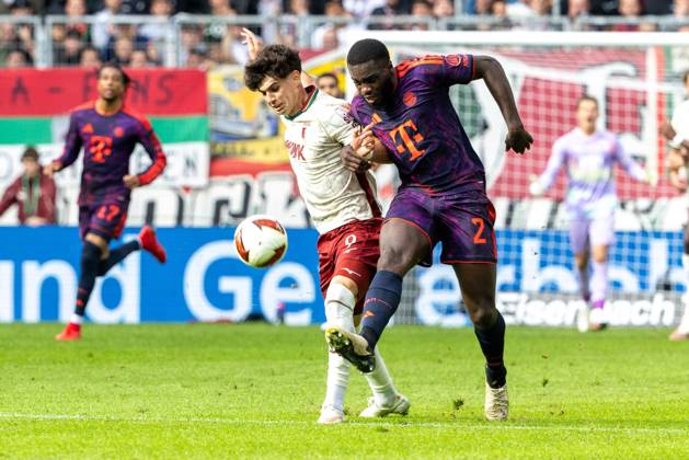 Rodrigo Ribeiro (FC Augsburg) and Dayot Upamecano (FC Bayern Munich) in a tackle, FC Augsburg vs. FC Bayern Munich, Bundesliga, Soccer, Bundesliga 1, Matchday 5, October 10, 2026. DFL regulations prohibit any use of photographs as image sequences and or quasi-video. Copyright: xkolbert-press PeterxFastlx