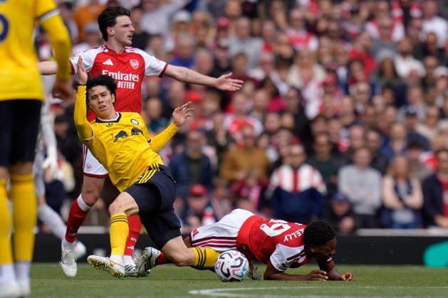 10th October 2026; Emirates Stadium, London, England; Premier League Football, Arsenal versus Leeds United; Ao Tanaka of Leeds United fouls Myles Lewis-Skelly of Arsenal TomxMajor