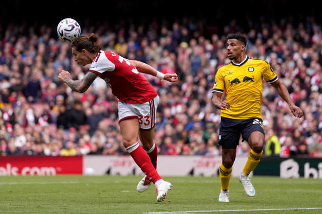10th October 2026; Emirates Stadium, London, England; Premier League Football, Arsenal versus Leeds United; Riccardo Calafiori of Arsenal heads the ball TomxMajor