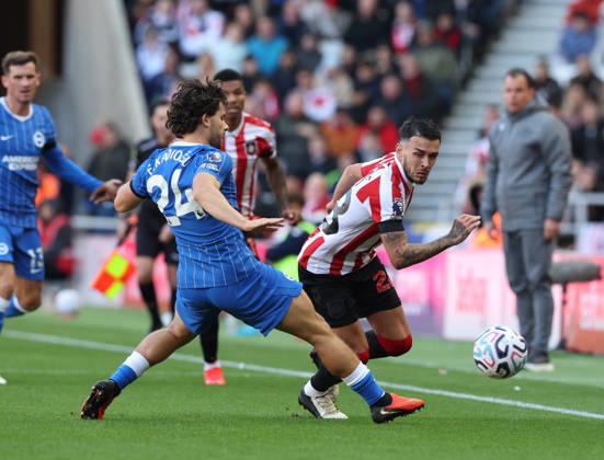 Sunderland, England, 10th October 2026. Enzo Le Fee (R) of Sunderland in action with Ferdi Kadioglu of Brighton and Hove Albion during the Sunderland vs Brighton and Hove Albion Premier League match at the Stadium Of Light, Sunderland. Picture credit should read: Nigel Roddis Sportimage EDITORIAL USE ONLY. No use with unauthorised audio, video, data, fixture lists, club league logos or live services. Online in-match use limited to 120 images, no video emulation. No use in betting, games or single club league player publications. SPI_017_NR_SUND_BRIG SPI-5059-0017