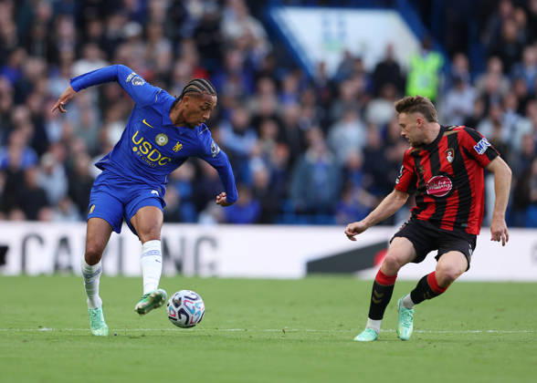 10th October 2026; Stamford Bridge, London, England; Premier League Football, Chelsea versus Bournemouth; Joao Pedro of Chelsea under pressure from Adrien Truffert of AFC Bournemouth JohnxPatrickxFletcher