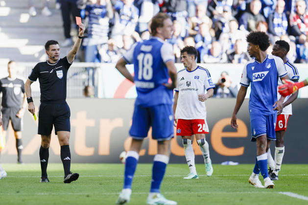 Referee Harm Osmers shows Bernardo of TSG Hoffenheim a yellow-red card—red card, ejection, two-card dismissal—during the Bundesliga match between TSG 1899 Hoffenheim and Hamburger SV at the PreZero Arena, Sinsheim, Germany, on October 10, 2026, in action during the Bundesliga match between TSG 1899 Hoffenheim and Hamburger SV at the PreZero Arena, Sinsheim, Germany, on October 10, 2026. DFB and DFL regulations prohibit any use of photographs as image sequences and or quasi-video, Copyright: HMBxMedia xHeikoxBecker