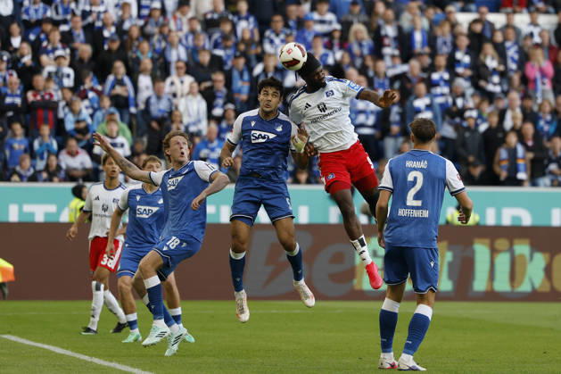 Terem Moffi of HSV outjumps Ozan Kabak of TSG Hoffenheim to head the ball into the net, scoring the goal to tie the game at 2–2, and celebrates the goal in the Bundesliga match between TSG 1899 Hoffenheim and Hamburger SV at the PreZero Arena, Sinsheim, Germany, on October 10, 2026, in action during the Bundesliga match between TSG 1899 Hoffenheim and Hamburger SV at the PreZero Arena, Sinsheim, Germany, on October 10, 2026. DFB and DFL regulations prohibit any use of photographs as image sequences and or quasi-video, Copyright: HMBxMedia xHeikoxBecker