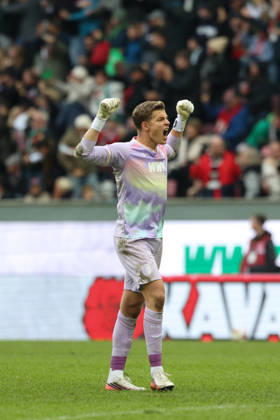 Finn Dahmen, FC Augsburg, No. 01, celebrates the goal that makes it 2–1; celebration, emotion; GER; FC Augsburg vs. FC Bayern Munich; soccer; Bundesliga; Matchday 5; 2026–2027 season; October 10, 2026, DFL and DFB regulations prohibit any use of photographs as image sequences and or quasi-video, GER, FC Augsburg vs. FC Bayern Munich, soccer, Bundesliga, Matchday 5, 2026–2027 season, October 10, 2026, Augsburg Copyright: xEibner-Pressefoto JennixMaulx EP_JML