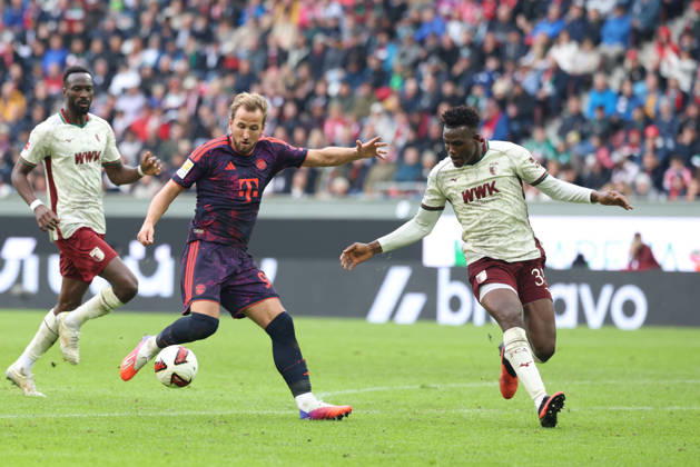 Harry Kane, FC Bayern Munich, 09, with Abdulai Bah, FC Augsburg, 35, GER, FC Augsburg vs. FC Bayern Munich, Soccer, Bundesliga, Matchday 5, 2026–2027 Season, October 10, 2026, DFL and DFB regulations prohibit any use of photographs as image sequences and or quasi-video, GER, FC Augsburg vs. FC Bayern Munich, Soccer, Bundesliga, Matchday 5, 2026–2027 season, October 10, 2026, Augsburg Copyright: xEibner-Pressefoto JennixMaulx EP_JML