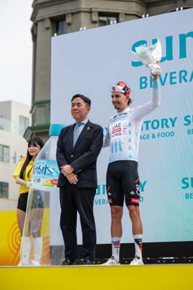 Tour De Kyushu Stage Finishes In Fukuoka s Tenjin For The First Time Matteo Malucelli of XDS Astana Team wins Stage 1 of the Mynavi Tour de Kyushu 2026 at the finish line on Tenjin Bridge in Fukuoka, Japan, on October 10, 2026. The Italian won the 152.0-kilometer Saga-Fukuoka stage in 3 hours 9 minutes 51 seconds, ahead of Luke Mudgway (Li Ning Star) and Alessio Delle Vedove (XDS Astana Team), and took the general and points classification leads. It was the first time the race finished in Tenjin, the commercial heart of Fukuoka, where a parade, stage events and food stalls marked the day. The race, first held in 2023 and part of the UCI Asia Tour (2.1 category), runs October 9-12 through six Kyushu prefectures under the official title We stand with Kumamoto. Mynavi Tour de Kyushu 2026, adopted to support areas affected by the Kumamoto earthquake. Fukuoka Japan  Copyright: xRyoxChix originalFilename:zhi-tourdeky261010_np8Zq