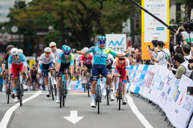Tour De Kyushu Stage Finishes In Fukuoka s Tenjin For The First Time Matteo Malucelli of XDS Astana Team wins Stage 1 of the Mynavi Tour de Kyushu 2026 at the finish line on Tenjin Bridge in Fukuoka, Japan, on October 10, 2026. The Italian won the 152.0-kilometer Saga-Fukuoka stage in 3 hours 9 minutes 51 seconds, ahead of Luke Mudgway (Li Ning Star) and Alessio Delle Vedove (XDS Astana Team), and took the general and points classification leads. It was the first time the race finished in Tenjin, the commercial heart of Fukuoka, where a parade, stage events and food stalls marked the day. The race, first held in 2023 and part of the UCI Asia Tour (2.1 category), runs October 9-12 through six Kyushu prefectures under the official title We stand with Kumamoto. Mynavi Tour de Kyushu 2026, adopted to support areas affected by the Kumamoto earthquake. Fukuoka Japan  Copyright: xRyoxChix originalFilename:zhi-tourdeky261010_npbzT