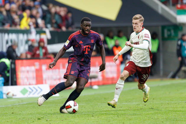 Dayot Upamecano 2, FC Bayern Munich, and Anton Kade 30, FC Augsburg, during the match between FC Augsburg and FC Bayern Munich, soccer, men s, Bundesliga, 2026–2027, Matchday 5 on October 10, 2026, in Augsburg, WWK ARENA. DFL and DFB regulations prohibit any use of photographs as image sequences and or quasi-video. Bayern, Germany