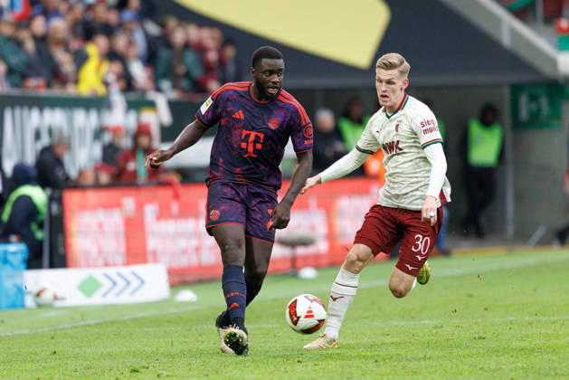 Dayot Upamecano 2, FC Bayern Munich, and Anton Kade 30, FC Augsburg, during the match between FC Augsburg and FC Bayern Munich, soccer, men s, Bundesliga, 2026–2027, Matchday 5 on October 10, 2026, in Augsburg, WWK ARENA. DFL and DFB regulations prohibit any use of photographs as image sequences and or quasi-video. Bayern, Germany