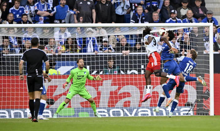 GOAL 2-2 Terem Moffi Hamburger SV HSV 09 Shot on goal Action Scoring chance Heading duel Tackle Action against Ozan Kabak TSG 1899 Hoffenheim 05 Wouter Burger TSG 1899 Hoffenheim 18 Goalkeeper Oliver Baumann TSG 1899 Hoffenheim 01 Referee Harm Osmers TSG 1899 Hoffenheim vs. Hamburger SV HSV 10 10 2026 DFL REGULATIONS PROHIBIT ANY USE OF PHOTOGRAPHS AS IMAGE SEQUENCES AND OR QUASI-VIDEO TSG 1899 Hoffenheim vs. Hamburger SV HSV