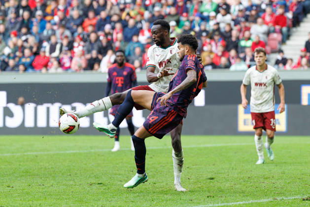 Chrislain Matsima 5, FC Augsburg, and Luis Diaz 14, FC Bayern Munich, during the match between FC Augsburg and FC Bayern Munich, soccer, men s, Bundesliga, 2026–2027, Matchday 5 on October 10, 2026, in Augsburg, WWK ARENA. DFL and DFB regulations prohibit any use of photographs as image sequences and or quasi-video. Bavaria, Germany