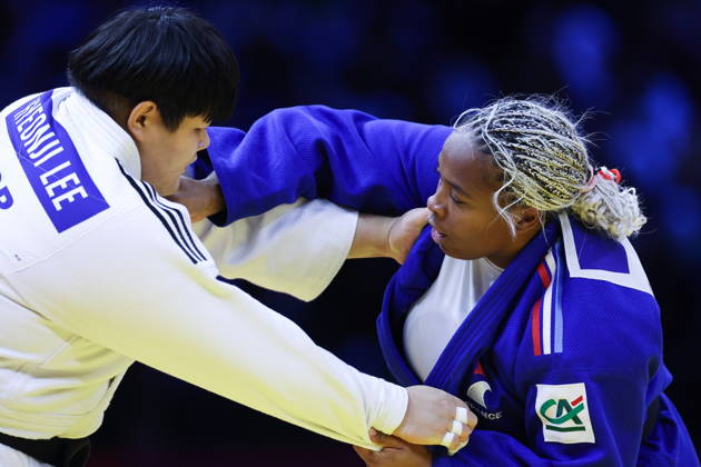 AZERBAIJAN, BAKU - OCTOBER 10, 2026: France s Romane Dicko (R) and South Korea s Lee Hyeon-ji fight in their heavyweight bout during the 2026 World Judo Championships at the National Gymnastics Arena. Mikhail Sinitsyn TASS 99046388