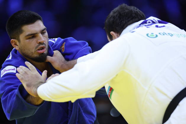 AZERBAIJAN, BAKU - OCTOBER 10, 2026: Azerbaijan s Dzhamal Gamzatkhanov (L) and Kanan Nasibov fight in their heavyweight bout during the 2026 World Judo Championships at the National Gymnastics Arena. Mikhail Sinitsyn TASS 99047510