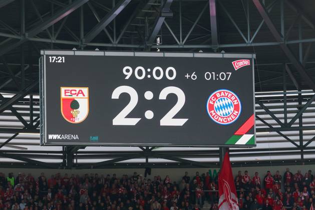 Final score on the scoreboard: 2–2, FC Augsburg vs. FC Bayern Munich, soccer, Bundesliga 1, Matchday 5, October 10, 2026. DFB and DFL regulations prohibit any use of photographs as image sequences and or quasi-video. Augsburg, Bayern, Germany Copyright: xkolbert-press ChristianxKolbertx