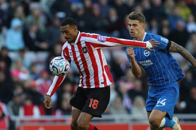 10th October 2026; Stadium of Light, Sunderland, England; Premier League Football, Sunderland versus Brighton and Hove Albion; Wilson Isidor of Sunderland holds off Luka Vuskovic of Brighton and Hove Albion DavexLofthouse