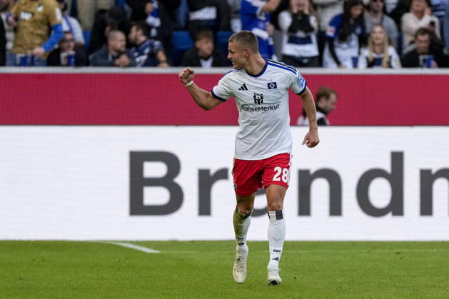 Goal scorer Miro Muheim (HSV), 28, a player for Hamburger SV (HSV), celebrates the goal that made the score 2–3; celebration, celebrating, goal celebration, goal scored, celebrate the goal, goal, celebration, celebrating the goal, joy, happiness, happy, optimistic, positive, game scene, highlight, cropped image, full-body shot, single frame, single photo, action, 10 10 2026, Sinsheim, Germany, soccer, Bundesliga, TSG 1899 Hoffenheim, Hamburger SV, DFB and DFL regulations prohibit any use of photographs as image sequences and or quasi-video xozx