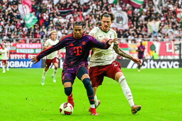 October 10, 2026, Germany, Soccer, Men s, Bundesliga 1, Matchday 5, FC Augsburg vs. FC Bayern Munich Michael Olise, Bayern Munich, 17, Calvin Brackelmann, FC Augsburg, 2, Augsburg WWK Arena, Bayern, Germany Copyright: xNordphotox xHafnerx