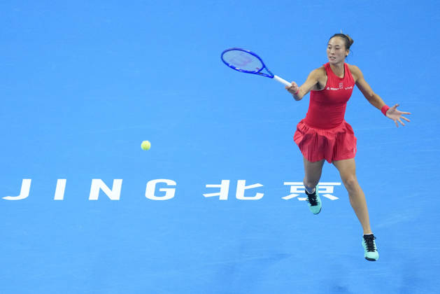 (261010) -- BEIJING, Oct. 10, 2026 -- Zheng Qinwen hits a return during the women s singles semifinal between Zheng Qinwen of China and Elise Mertens of Belgium at 2026 China Open tennis tournament in Beijing, China, Oct. 10, 2026. ) (SP)CHINA-BEIJING-TENNIS-CHINA OPEN-WOMEN S SINGLES-SEMIFINAL (CN) JuxHuanzong