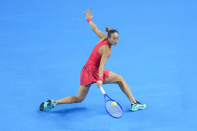 (261010) -- BEIJING, Oct. 10, 2026 -- Zheng Qinwen hits a return during the women s singles semifinal between Zheng Qinwen of China and Elise Mertens of Belgium at 2026 China Open tennis tournament in Beijing, China, Oct. 10, 2026. ) (SP)CHINA-BEIJING-TENNIS-CHINA OPEN-WOMEN S SINGLES-SEMIFINAL (CN) JuxHuanzong