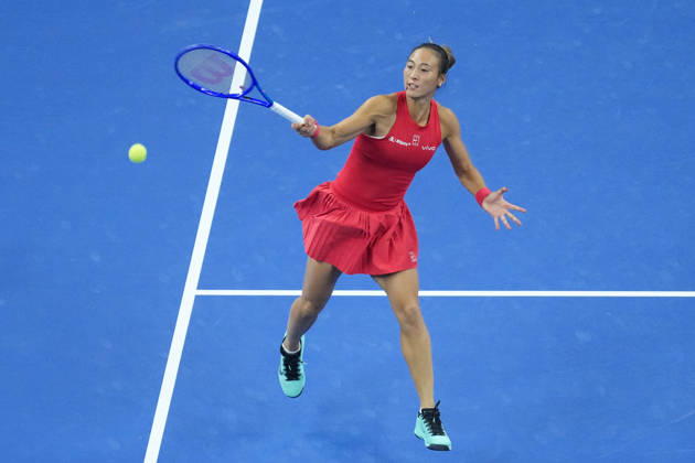 (261010) -- BEIJING, Oct. 10, 2026 -- Zheng Qinwen hits a return during the women s singles semifinal between Zheng Qinwen of China and Elise Mertens of Belgium at 2026 China Open tennis tournament in Beijing, China, Oct. 10, 2026. ) (SP)CHINA-BEIJING-TENNIS-CHINA OPEN-WOMEN S SINGLES-SEMIFINAL (CN) JuxHuanzong