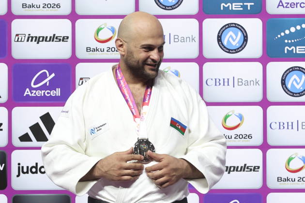 AZERBAIJAN, BAKU - OCTOBER 10, 2026: Azerbaijan s Ushangi Kokauri celebrates his silver medal during a victory ceremony for the men s heavyweight event as the 2026 World Judo Championships takes place at the National Gymnastics Arena. Mikhail Sinitsyn TASS  99052278