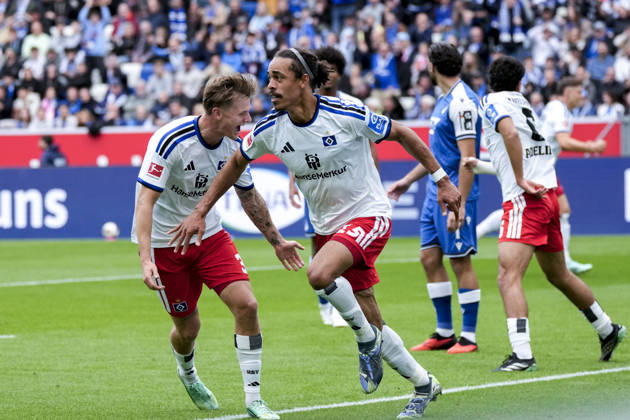 From left: David Möller Wolfe (HSV), 3; goal scorer Yussuf Poulsen (HSV), 15; players from Hamburger SV (HSV) celebrate the goal that made the score 0–1, Celebration, goal celebration, scoring a goal, celebrate the goal, goal, celebration, celebrating the goal, joy, happiness, happy, optimistic, positive, game scene, highlight, action, 10 10 2026, Sinsheim, Germany, soccer, Bundesliga, TSG 1899 Hoffenheim, Hamburger SV, DFB and DFL regulations prohibit any use of photographs as image sequences and or quasi-video xozx
