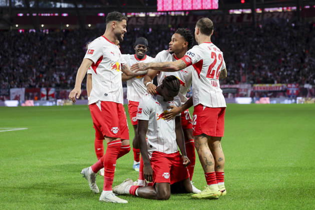 Ezechiel Banzuzi of RB Leipzig celebrates his goal with his teammates during the Bundesliga match between RB Leipzig and Eintracht Frankfurt, at Red Bull Arena on October 10, 2026, in Leipzig, Germany. Photo by Marco Steinbrenner, DeFodi Images. Ezechiel Banzuzi of RB Leipzig celebrates his goal with teammates during the Bundesliga match between RB Leipzig and Eintracht Frankfurt at Red Bull Arena on October 10, 2026 in Leipzig, Germany. Photo by Marco Steinbrenner, DeFodi Images. DFB and DFL regulations prohibit any use of photographs as image sequences and or quasi-video. Photo by Marco Steinbrenner, DeFodi Images.