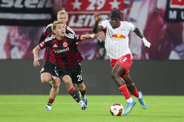 Ritsu Doan of Eintracht Frankfurt and Castello Lukeba of RB Leipzig battle for the ball during the Bundesliga match between RB Leipzig and Eintracht Frankfurt, Red Bull Arena on October 10, 2026, in Leipzig, Germany. Photo by Marco Steinbrenner, DeFodi Images. Ritsu Doan of Eintracht Frankfurt and Castello Lukeba of RB Leipzig battle for the ball during the Bundesliga match between RB Leipzig and Eintracht Frankfurt at Red Bull Arena on October 10, 2026 in Leipzig, Germany. Photo by Marco Steinbrenner, DeFodi Images. DFB and DFL regulations prohibit any use of photographs as image sequences and or quasi-video. Photo by Marco Steinbrenner, DeFodi Images