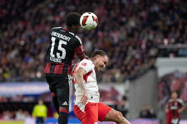 1 German Bundesliga: RB Leipzig vs. Eintracht Frankfurt, October 10, 2026; Noel Aseko (15), Eintracht Frankfurt, with captain David Raum (22), RB Leipzig, in a header duel. LEIPZIG, GERMANY OCTOBER 10 Bundesliga match between RB Leipzig and Eintracht Frankfurt at the Red Bull Arena on Matchday 5 of the 1. Bundesliga on October 10, 2026 in Leipzig, Germany. DFL regulations prohibit any use of photographs as image sequences and or quasi-video. Copyright: xBEAUTIFULxSPORTS JanxKaeferx