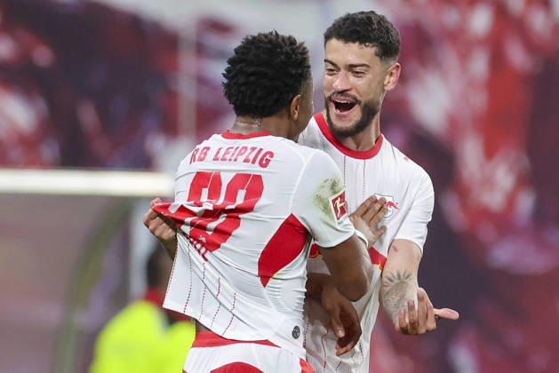 Christopher Nkunku of RB Leipzig celebrates his goal—making the score 4–0—with Romulo Cardoso of RB Leipzig during the Bundesliga 1 match between RB Leipzig and Eintracht Frankfurt, Red Bull Arena on October 10, 2026, in Leipzig, Germany. Photo by Marco Steinbrenner, DeFodi Images. Christopher Nkunku of RB Leipzig celebrates after scoring his team’s fourth goal with Romulo Cardoso of RB Leipzig during the Bundesliga match between RB Leipzig and Eintracht Frankfurt at Red Bull Arena on October 10, 2026 in Leipzig, Germany. Photo by Marco Steinbrenner, DeFodi Images. DFB and DFL regulations prohibit any use of photographs as image sequences and or quasi-video. Photo by Marco Steinbrenner, DeFodi Images.