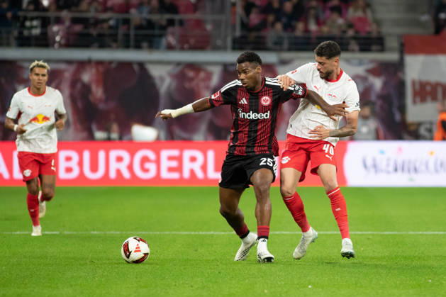 1 German Bundesliga: RB Leipzig vs. Eintracht Frankfurt, October 10, 2026—Raphael Onyedika (25, Eintracht Frankfurt) vs. Romulo Cardoso da Cruz (40, RB Leipzig). LEIPZIG, GERMANY OCTOBER 10 Bundesliga match between RB Leipzig and Eintracht Frankfurt at the Red Bull Arena on Matchday 5 of the Bundesliga on October 10, 2026 in Leipzig, Germany. DFL regulations prohibit any use of photographs as image sequences and or quasi-video. Copyright: xBEAUTIFULxSPORTS JanxKaeferx