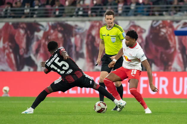 1 German Bundesliga: RB Leipzig vs. Eintracht Frankfurt, October 10, 2026. From left: Noel Aseko (15), Eintracht Frankfurt; referee Daniel Siebert; Christopher Nkunku (28), RB Leipzig. LEIPZIG, GERMANY OCTOBER 10 Bundesliga match between RB Leipzig and Eintracht Frankfurt at the Red Bull Arena on Matchday 5 of the 1. Bundesliga on October 10, 2026 in Leipzig, Germany. DFL regulations prohibit any use of photographs as image sequences and or quasi-video. Copyright: xBEAUTIFULxSPORTS JanxKaeferx