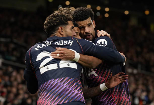 Manchester, England, 10th October 2026. Dominic Solanke of Tottenham Hotspur (R) celebrates after scoring during the Manchester United, ManU vs Tottenham Hotspur Premier League match at Old Trafford, Manchester. Picture credit should read: Andrew Yates Sportimage EDITORIAL USE ONLY. No use with unauthorised audio, video, data, fixture lists, club league logos or live services. Online in-match use limited to 120 images, no video emulation. No use in betting, games or single club league player publications. SPI_054_AY_MANUTD_SPURS SPI-5058-0054