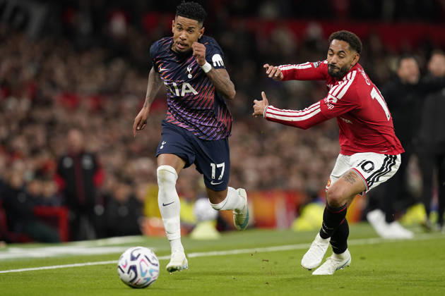 Manchester, England, 10th October 2026. Savio of Tottenham Hotspur (L) is challenged by Matheus Cunha of Manchester United, ManU during the Manchester United vs Tottenham Hotspur Premier League match at Old Trafford, Manchester. Picture credit should read: Andrew Yates Sportimage EDITORIAL USE ONLY. No use with unauthorised audio, video, data, fixture lists, club league logos or live services. Online in-match use limited to 120 images, no video emulation. No use in betting, games or single club league player publications. SPI_060_AY_MANUTD_SPURS SPI-5058-0060