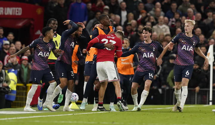 Manchester, England, 10th October 2026. Rodrigo Bentancur of Tottenham Hotspur (2L) confronts Luke Shaw of Manchester United, ManU after head butting him during the Manchester United vs Tottenham Hotspur Premier League match at Old Trafford, Manchester. Picture credit should read: Andrew Yates Sportimage EDITORIAL USE ONLY. No use with unauthorised audio, video, data, fixture lists, club league logos or live services. Online in-match use limited to 120 images, no video emulation. No use in betting, games or single club league player publications. SPI_061_AY_MANUTD_SPURS SPI-5058-0061