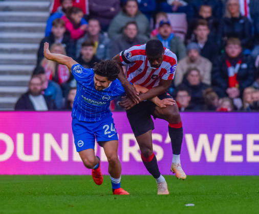 Sunderland v Brighton, Premier League, Football, Stadium Of Light, Sunderland UK - 10 Oct 2026 Ferdi Kadioglu of Brighton & Hove Albion Football Club battles with Sunderland player Sunderland Stadium Of Light Tyne and Wear UK, UK NEWSPAPERS OUT Copyright: xAdamxCookx