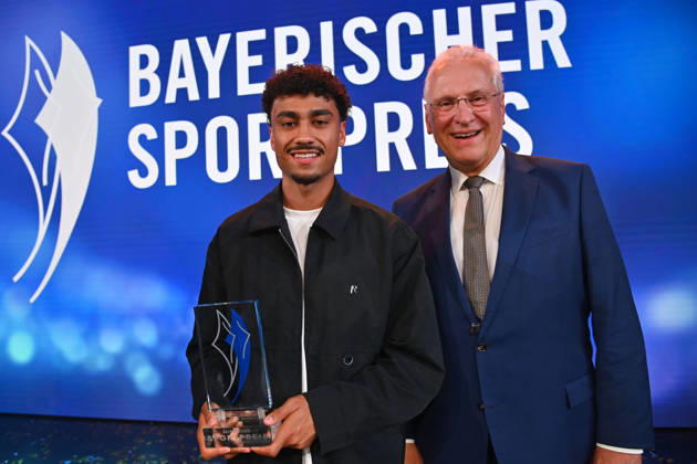Nathaniel BROWN of Bayern Munich receives his award from Joachim HERRMANN, Bavarian Minister of the Interior, at the 2026 Bavarian Sports Awards at BMW Welt, Red Carpet, on October 10, 2026