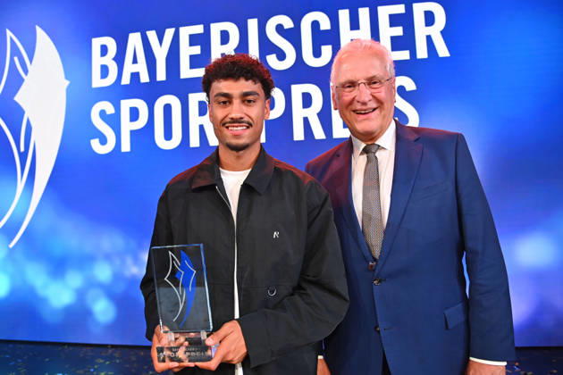 Nathaniel BROWN of Bayern Munich receives his award from Joachim HERRMANN, Bavarian Minister of the Interior, at the 2026 Bavarian Sports Awards at BMW Welt, Red Carpet, on October 10, 2026