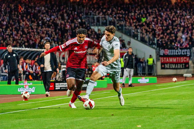 Rayan Ghrieb, 1. FC Nuremberg, 7, and Joakim Maehle, VfL Wolfsburg, 21, GER, 1. FC Nuremberg vs. VfL Wolfsburg, soccer, 2. Bundesliga, Matchday 7, 2026–2027 season, October 10, 2026, DFL regulations prohibit any use of photographs as image sequences and or quasi-video, GER, 1. FC Nuremberg vs. VfL Wolfsburg, Soccer, 2. Bundesliga, Matchday 7, 2026–2027 Season, October 10, 2026, Nuremberg Copyright: xEibner-Pressefoto MaxxVogelx EP_MVL