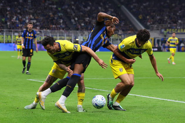 FC Internazionale v Parma Calcio 1913 - Serie A - Season 2026-2027 Milan, Italy, 10th October 2026. Djed Spence of FC Internazionale clashes with Emanuele Valeri and Simone Lontani of Parma Calcio during the FC Internazionale vs Parma Calcio 1913 Serie A match at Giuseppe Meazza, Milan. Picture credit should read: Jonathan Moscrop Milan Stadio Giuseppe Meazza Italy
