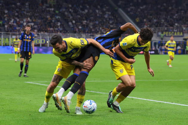 FC Internazionale v Parma Calcio 1913 - Serie A - Season 2026-2027 Milan, Italy, 10th October 2026. Djed Spence of FC Internazionale clashes with Emanuele Valeri and Simone Lontani of Parma Calcio during the FC Internazionale vs Parma Calcio 1913 Serie A match at Giuseppe Meazza, Milan. Picture credit should read: Jonathan Moscrop Milan Stadio Giuseppe Meazza Italy