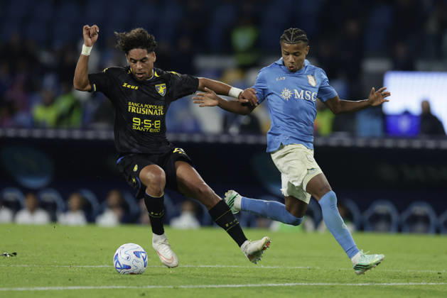 Serie a football match SSC Napoli vs Frosinone Frosinone s Gabonese defender Anthony Oyono challenges for the ball with Napoli s Brazilian forward David Neres during the Serie A football match between SSC Napoli vs Frosinone at the Diego Armando Maradona Stadium in Naples, southern Italy, on October 10, 2026. _BPH8963 Copyright: xAntonioxBalascox
