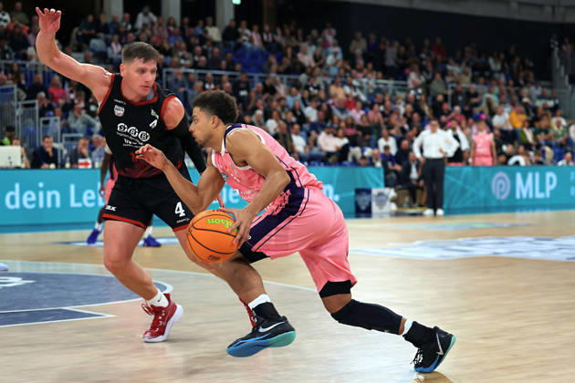 From left in a one-on-one matchup: Brock Gardner (SBB Baskets Wolmirstedt), 4, Kevin McClain (MLP Academics Heidelberg), 03 GER BBL MLP Academics Heidelberg SBB Baskets Wolmirstedt Basketball Barmer 2 Basketball Bundesliga ProA Matchday 4, 2026–2027 season, October 10, 2026 GER MLP Academics Heidelberg SBB Baskets Wolmirstedt, Basketball Barmer 2 Basketball Bundesliga ProA Matchday 4, 2026–2027 season, October 10, 2026, Heidelberg Copyright: xEibner-Pressefoto JoergxHirschx EP_JHH