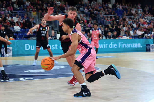 From left in a one-on-one matchup: Brock Gardner (SBB Baskets Wolmirstedt), 4, Kevin McClain (MLP Academics Heidelberg), 03 GER BBL MLP Academics Heidelberg SBB Baskets Wolmirstedt Basketball Barmer 2 Basketball Bundesliga ProA Matchday 4, 2026–2027 season, October 10, 2026 GER MLP Academics Heidelberg SBB Baskets Wolmirstedt, Basketball Barmer 2 Basketball Bundesliga ProA Matchday 4, 2026–2027 season, October 10, 2026, Heidelberg Copyright: xEibner-Pressefoto JoergxHirschx EP_JHH