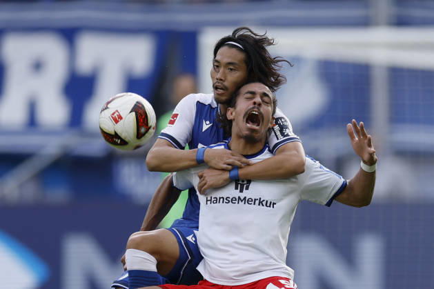 From left to right: Koki Machida of TSG Hoffenheim and Yussuf Poulsen of HSV, in the Bundesliga match between TSG 1899 Hoffenheim and Hamburger SV at the PreZero Arena, Sinsheim, Germany, on October 10, 2026, in action during the Bundesliga match between TSG 1899 Hoffenheim and Hamburger SV at the PreZero Arena, Sinsheim, Germany, on October 10, 2026. DFB and DFL regulations prohibit any use of photographs as image sequences and or quasi-video, Copyright: HMBxMedia xHeikoxBecker