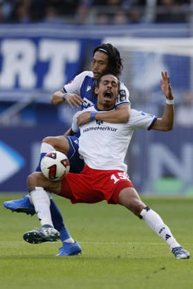 From left to right: Koki Machida of TSG Hoffenheim and Yussuf Poulsen of HSV, in the Bundesliga match between TSG 1899 Hoffenheim and Hamburger SV at the PreZero Arena, Sinsheim, Germany, on October 10, 2026, in action during the Bundesliga match between TSG 1899 Hoffenheim and Hamburger SV at the PreZero Arena, Sinsheim, Germany, on October 10, 2026. DFB and DFL regulations prohibit any use of photographs as image sequences and or quasi-video, Copyright: HMBxMedia xHeikoxBecker